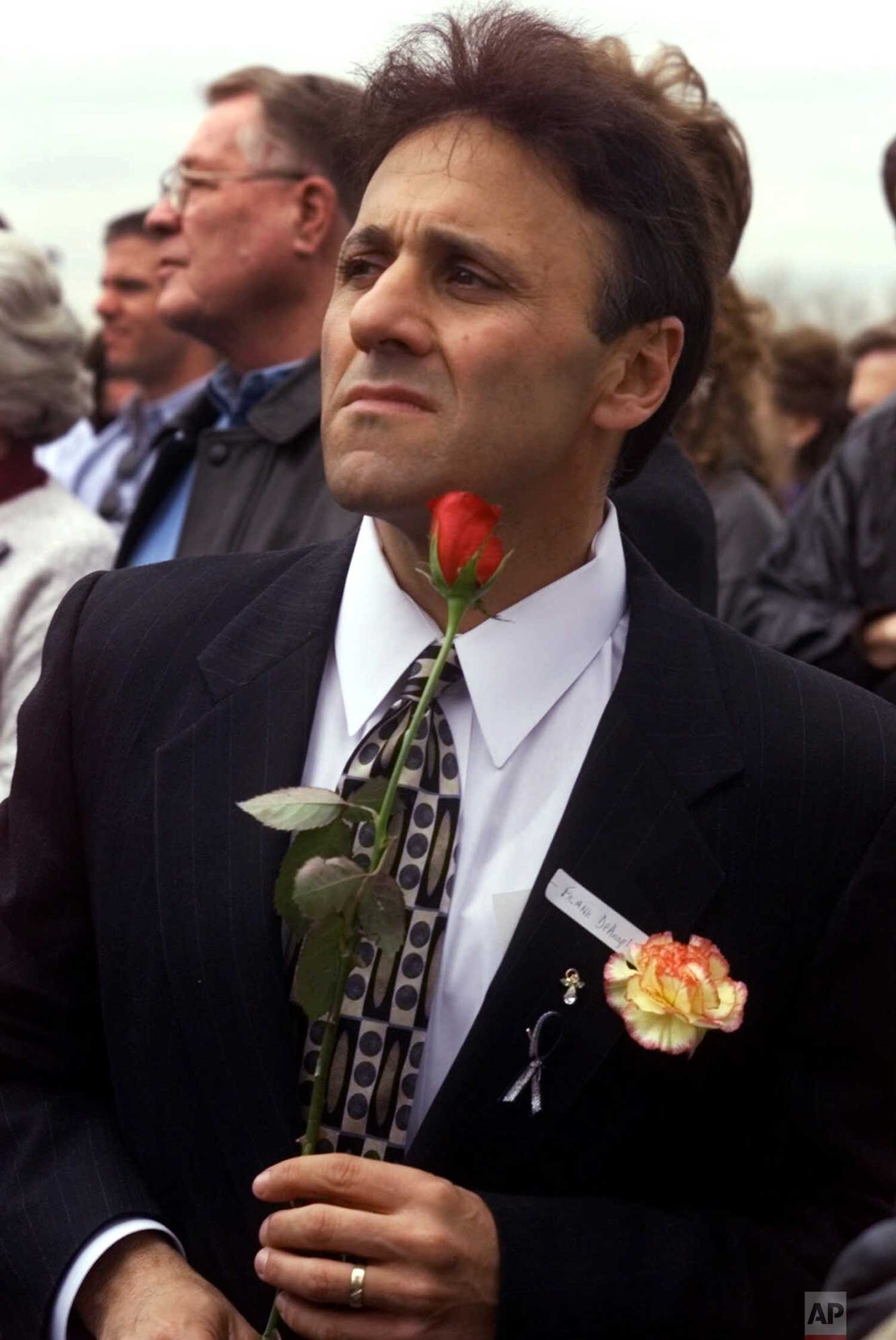  Frank Deanglis, the principal of Columbine High School, attends a community-wide memorial service on Sunday, April 25, 1999, in Littleton, Colo., for the victims of the shooting rampage at the school. (AP Photo/Khui Bui) 