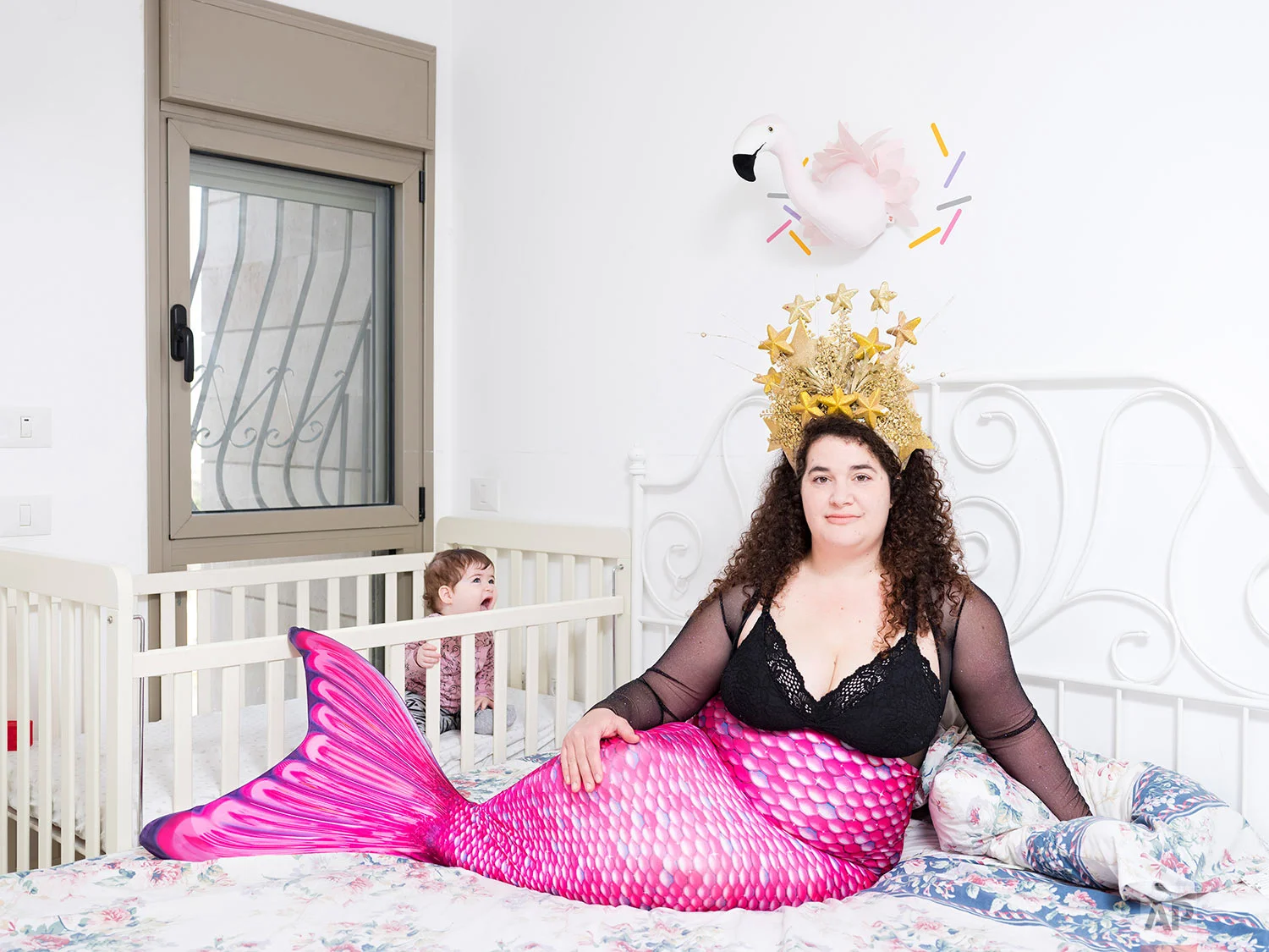 In this Friday, Feb. 22, 2019 photo, Hadas Kellner, a member of the Israeli Mermaid Community, poses for a portrait as she wears a mermaid tail at her home in Yahud, Israel. (AP Photo/Oded Balilty)