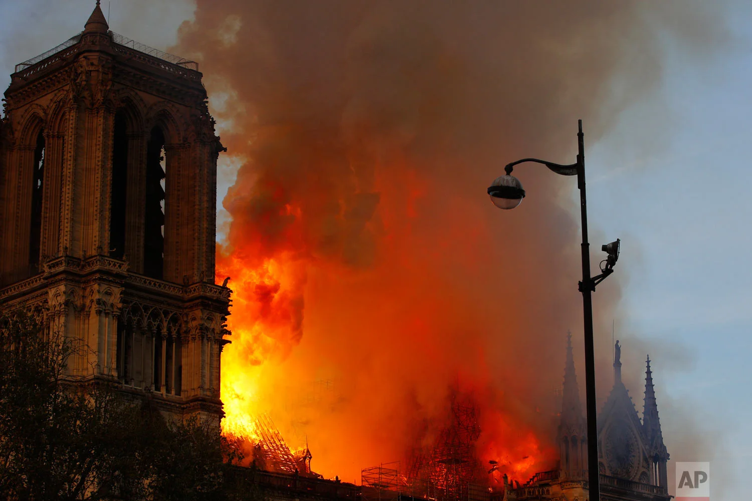 Notre Dame Cathedral burns in Paris, Monday, April 15, 2019. (AP Photo/Francois Mori)