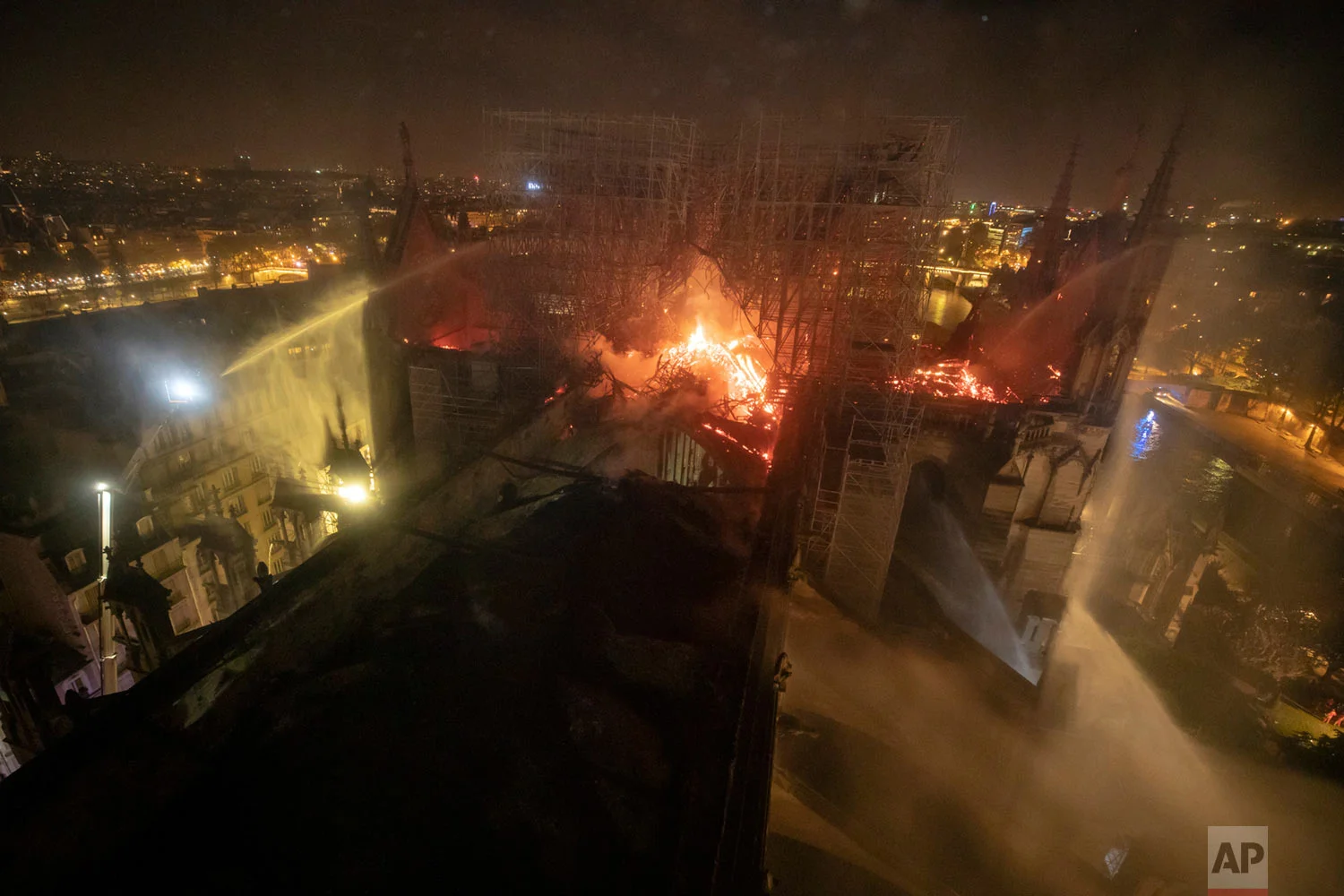 This photo provided by the Paris Fire Brigade shows flames rising from the Notre Dame Cathedral, April 15, 2019. (Benoit Moser/BSPP via AP)