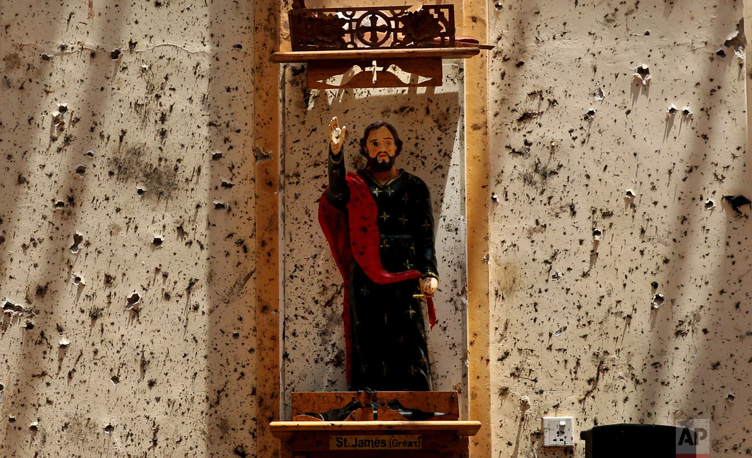 A statue of Jesus Christ stands on the altar of St. Sebastian's Church in Negombo, Sri Lanka, April 25, 2019. (AP Photo/Manish Swarup)