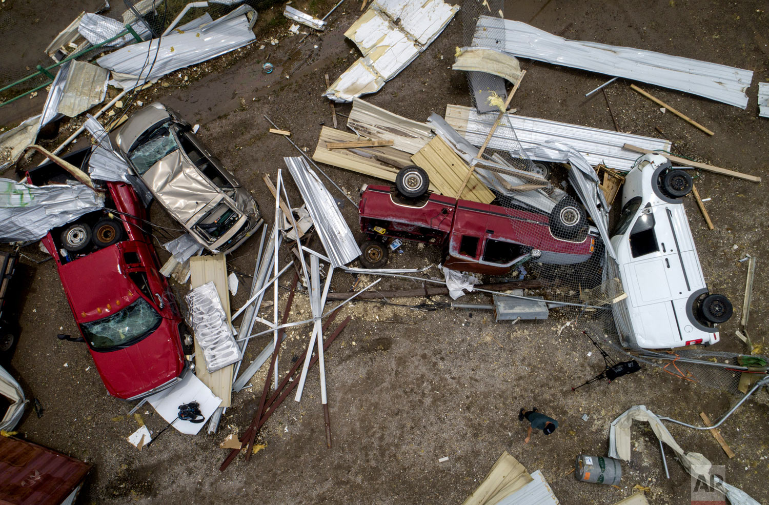  Vehicles are strewn on the property of McCourt & Sons Equipment Inc. after a tornado tore through the area in La Grange, Texas, on Friday May 3, 2019. (Jay Janner/Austin American-Statesman via AP) 