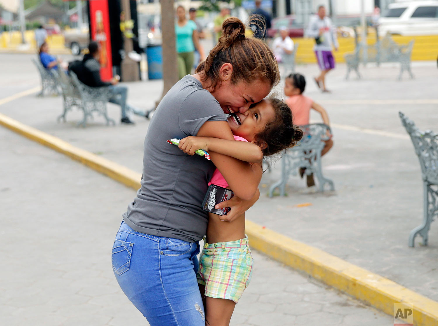 Migrants seeking asylum in the United States play at their encampment near the international bridge in Matamoros, Mexico, April 30, 2019. (AP Photo/Eric Gay)