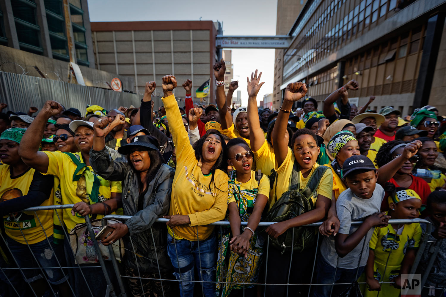 Supporters of the African National Congress (ANC) party cheer during a victory rally in downtown Johannesburg, South Africa, May 12, 2019. (AP Photo/Ben Curtis)