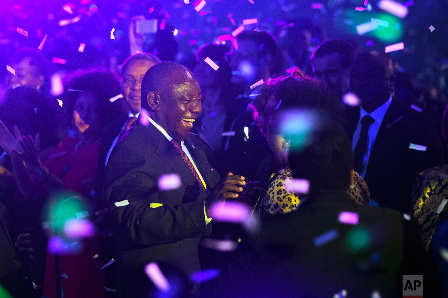 South Africa President Cyril Ramaphosa celebrates after the Independent Electoral Commission announced the final results in South Africa's general election in Pretoria, May 11, 2019. (AP Photo/Jerome Delay)