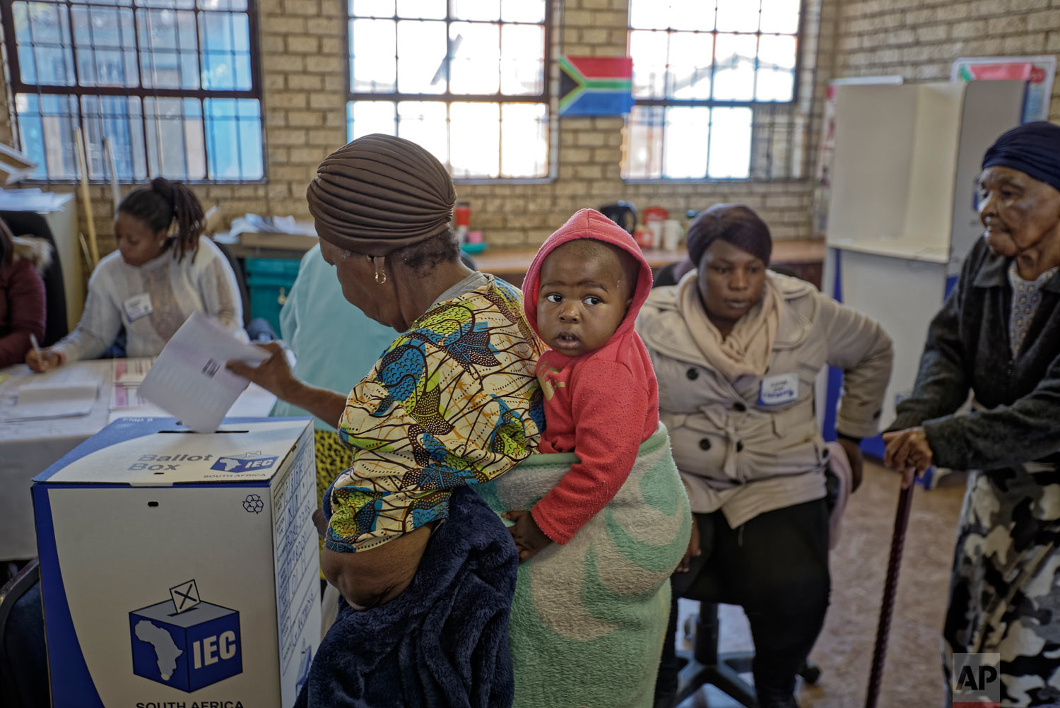 South Africans cast their votes at the Hitekani Primary School in Soweto, Johannesburg, South Africa, May 8, 2019. (AP Photo/Ben Curtis)