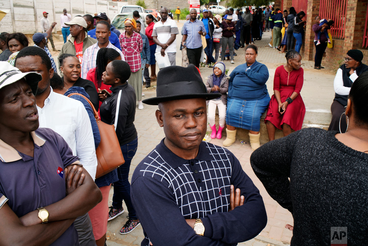 South Africans line up to cast their vote in the May 8, 2019, general elections in Diepsloot, South Africa. South (AP Photo/Jerome Delay)