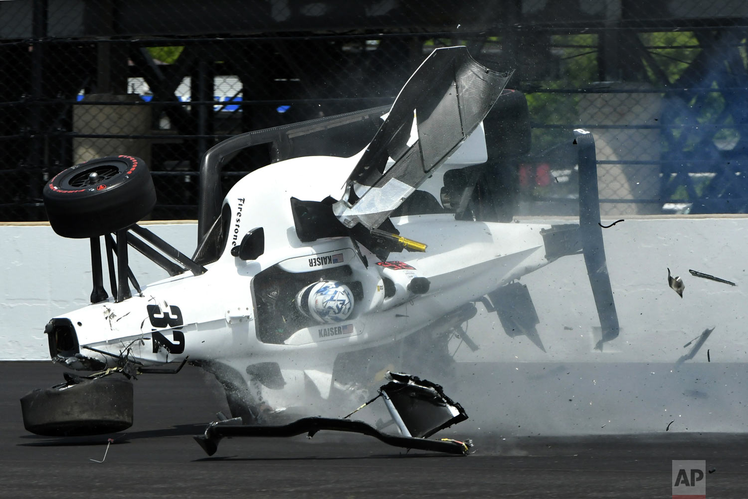  The car driven by Kyle Kaiser goes airborne after hitting the wall along the third turn during practice for the Indianapolis 500 IndyCar auto race at Indianapolis Motor Speedway, Friday, May 17, 2019 in Indianapolis. (AP Photo/Tom Pyle) 