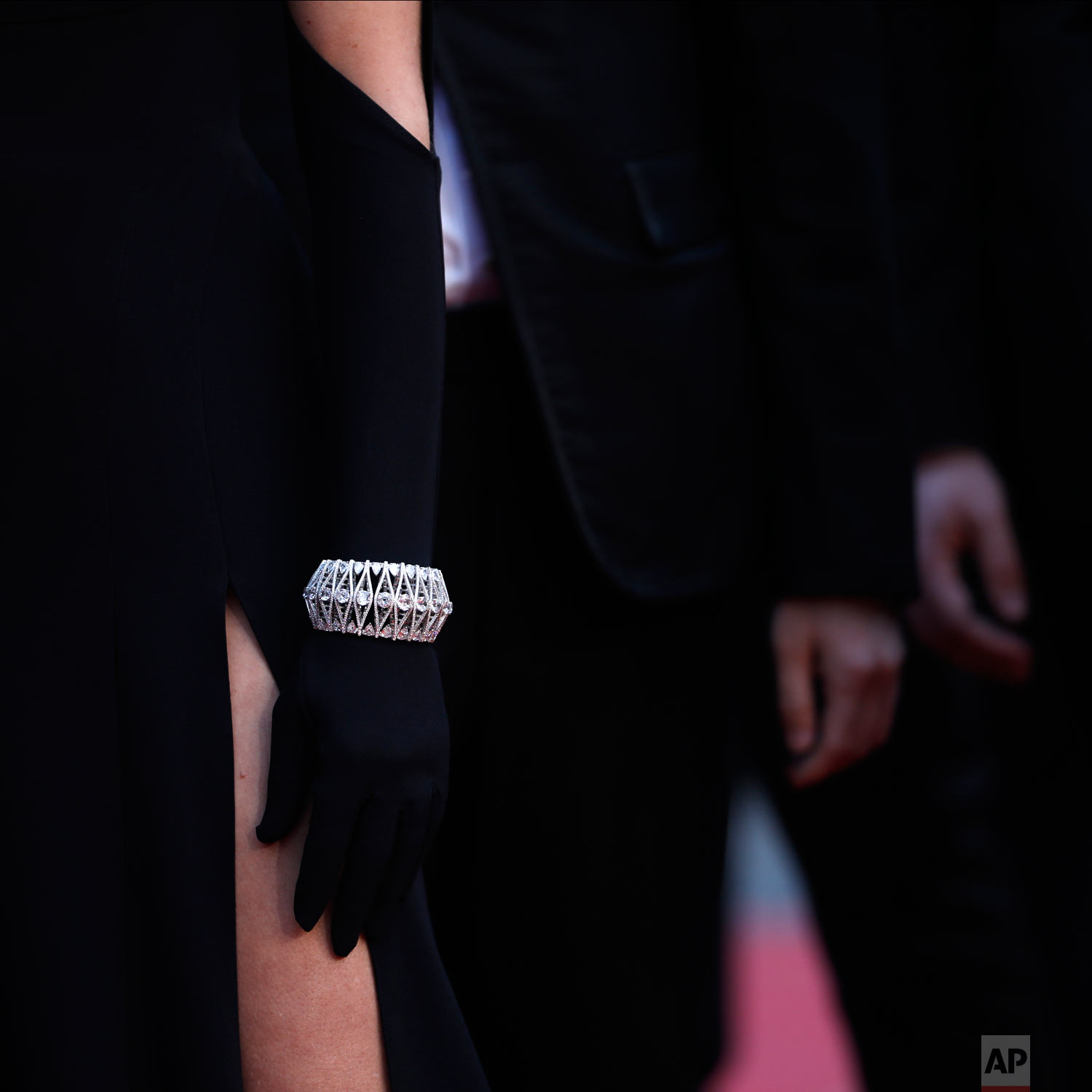 This shows the hand of the actress Chloe Sevigny at the opening ceremony and premiere of the film 'The Dead Don't Die' at the 72nd international film festival, Cannes, southern France, May 14, 2019. (AP Photo/Petros Giannakouris)