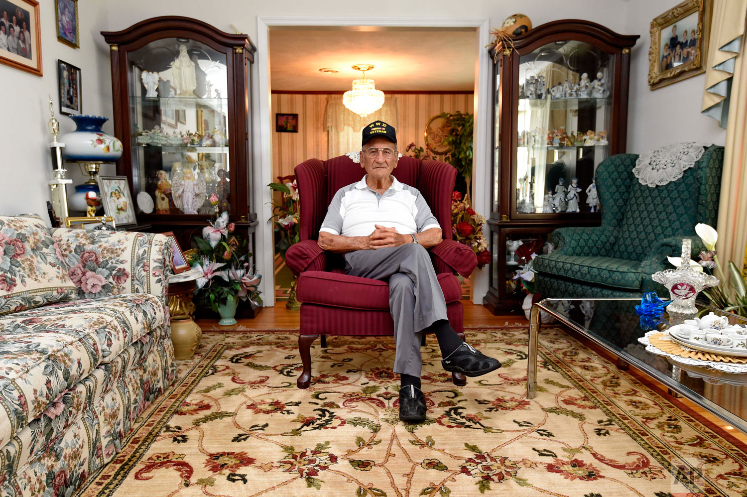 Dennis Trudeau, a World War II veteran who landed in Normandy on D-Day, poses for a photo at his home May, 21, 2019, in Grovetown, Ga. Trudeau had joined the Canadian military at 17 and became a paratrooper in part because they paid an extra $50 a month. (AP Photo/Richard Shiro)