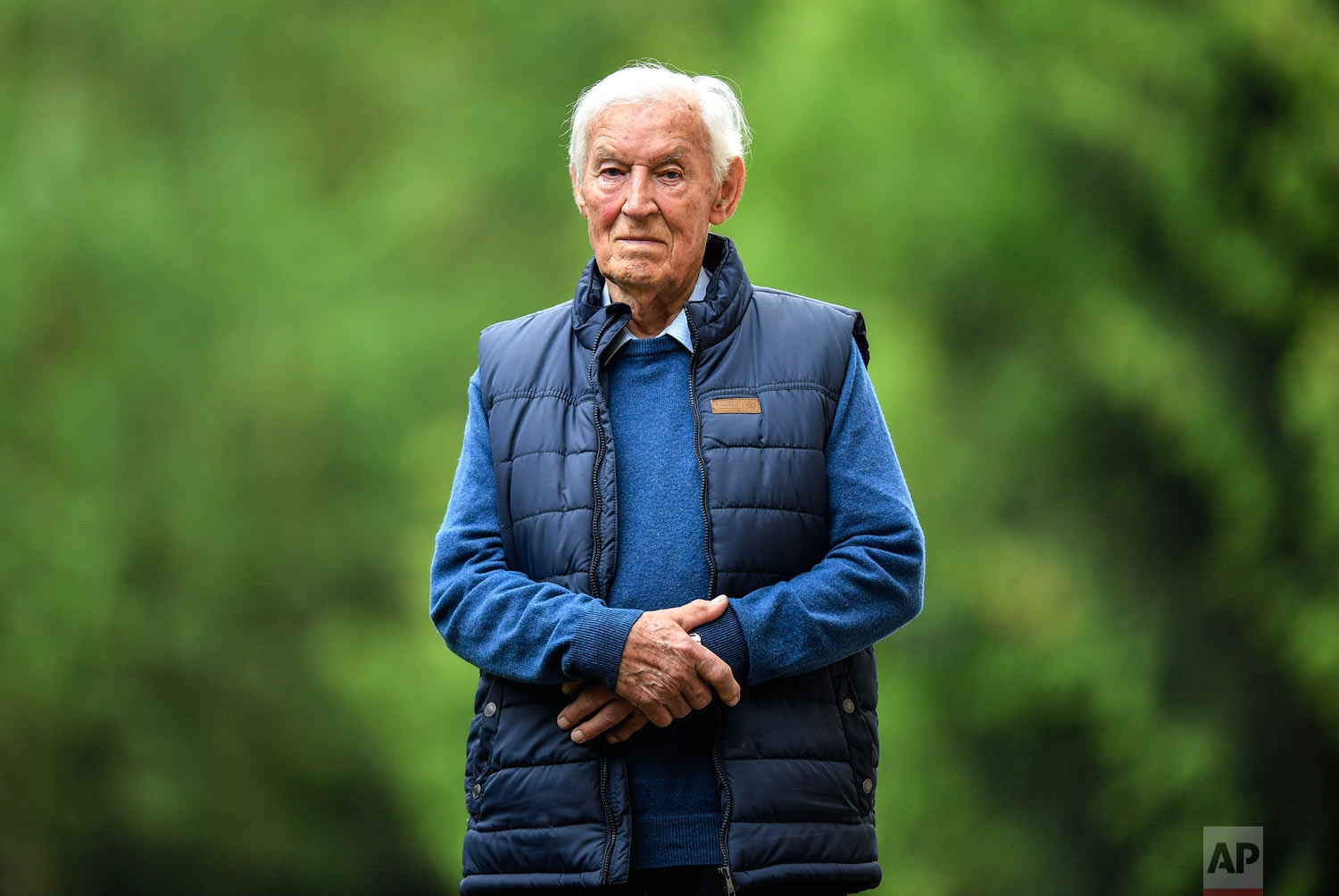 German D-Day veteran Paul Golz poses for a photo at his home in Koenigswinter, Germany, after an interview with The Associated Press on May 17, 2019. Golz and his comrades were taken prisoner by an American patrol on June 9, 1944, three days after the Allied landing. (AP Photo/Martin Meissner)
