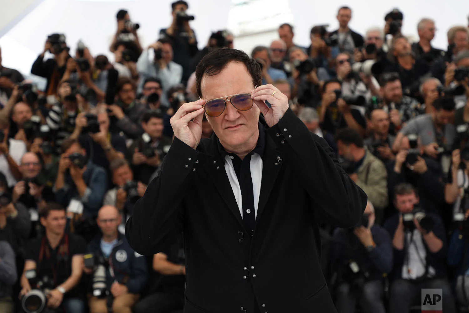 Director Quentin Tarantino poses for photographers at the photo call for the film 'Once Upon a Time in Hollywood' at the 72nd international film festival, Cannes, southern France, May 22, 2019. (Photo by Vianney Le Caer/Invision/AP)