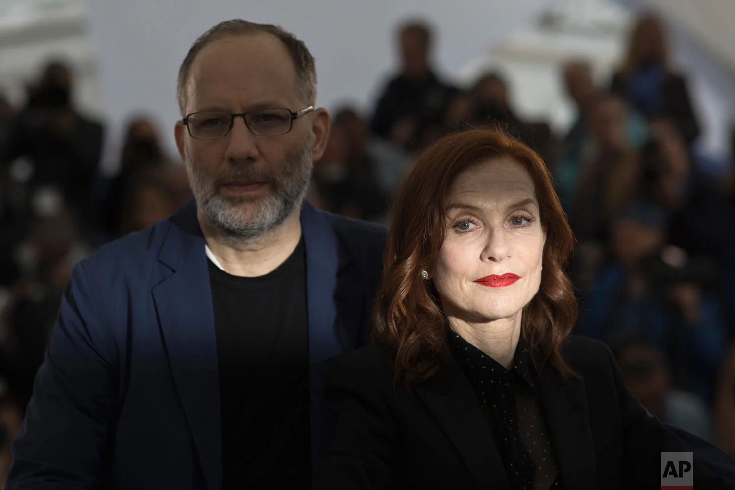 Director Ira Sachs, left, and actress Isabelle Huppert pose for photographers at the photo call for the film 'Frankie' at the 72nd international film festival, Cannes, southern France, May 21, 2019. (AP Photo/Petros Giannakouris)