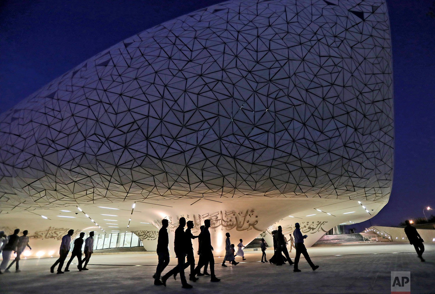  In this Sunday, May 12, 2019 photo, people leave the mosque to have their evening meal for Iftar during the holy month of Ramadan, at the Qatar Faculty of Islamic Studies in Doha, Qatar. (AP Photo/Kamran Jebreili) 