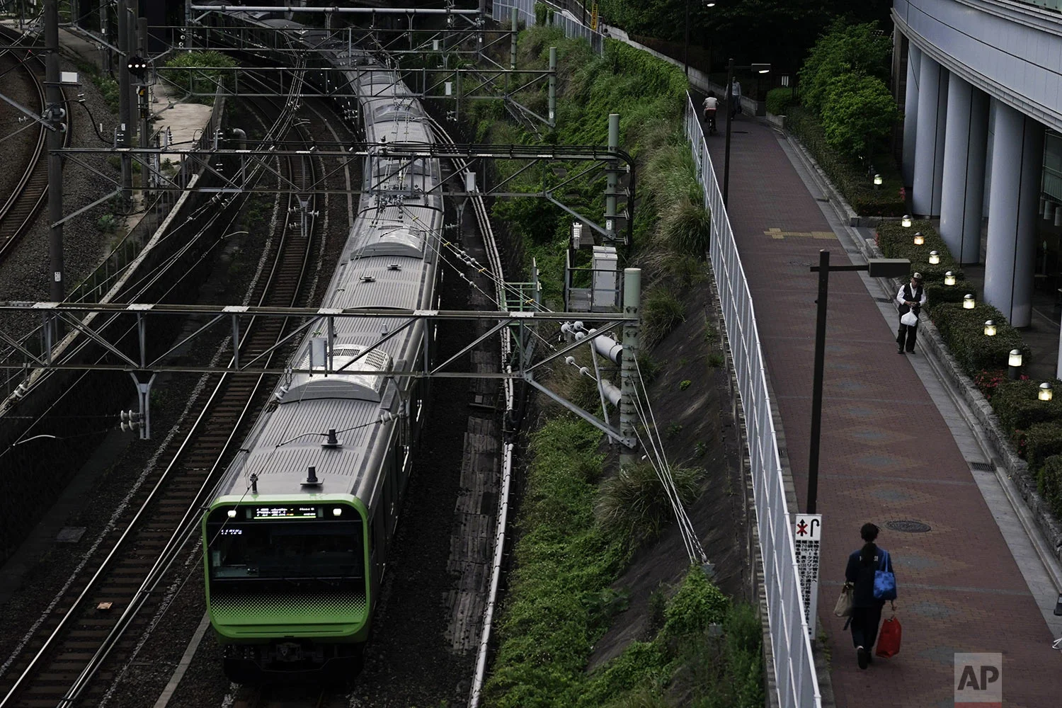 A Yamanote Line train departs from Ikebukuro Station in Tokyo, Wednesday, May 22, 2019. (AP Photo/Jae C. Hong)