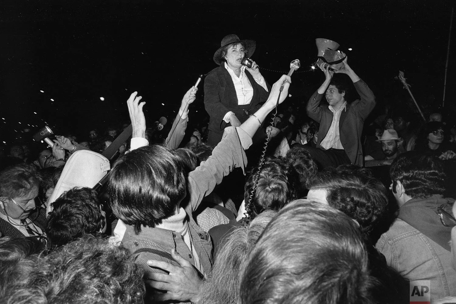 In this Wednesday, June 8, 1977 file photo, former U.S. Rep. Bella Abzug addresses a rally in New York as thousands turn out to protest the repeal of a homosexual rights law in Dade County, Fla. Abzug, a candidate for mayor in New York, urged gay rights activists to undertake a public education program to gain their rights. (AP Photo/Suzanne Vlamis)