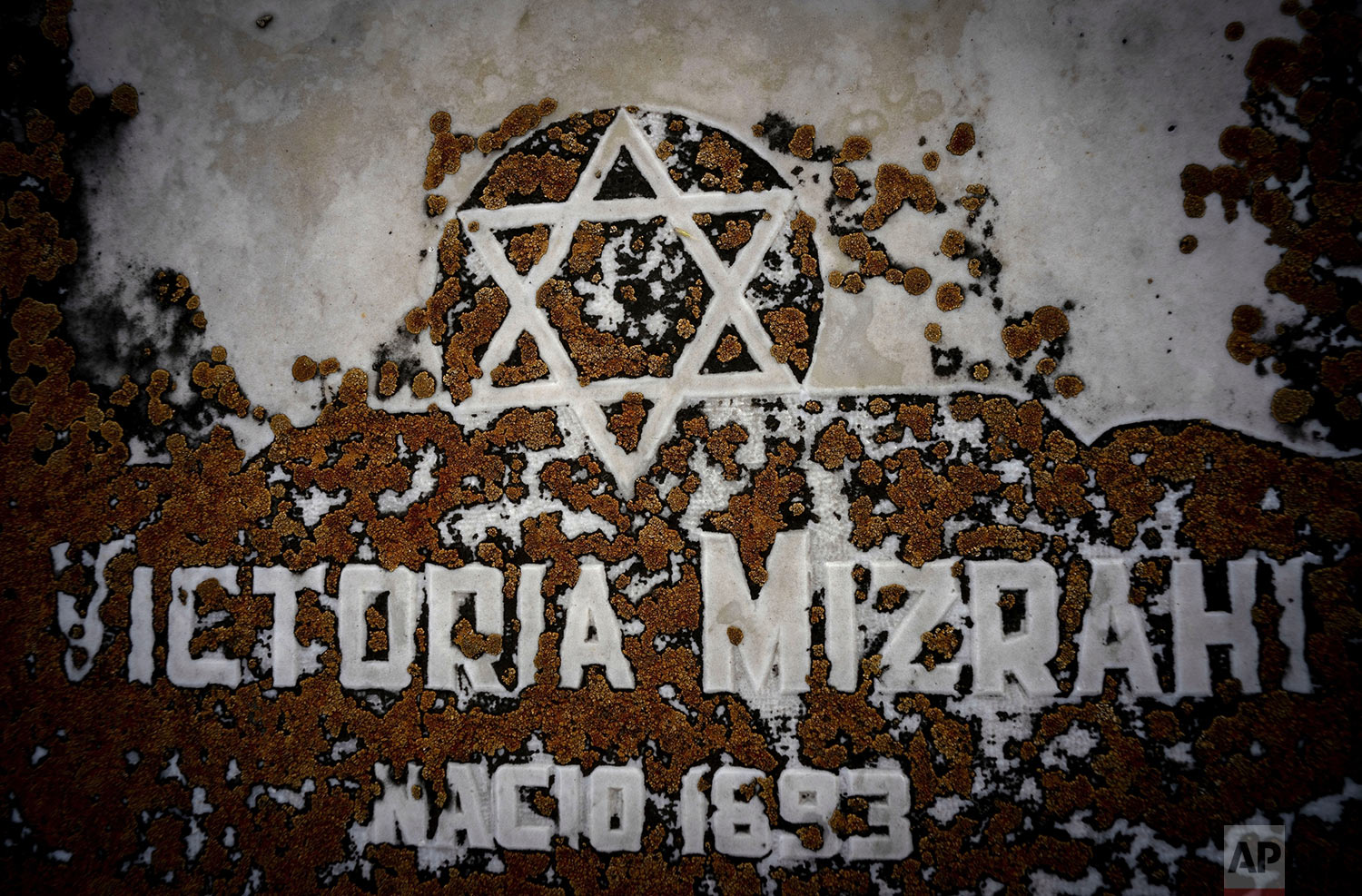 The Star of David decorates a tomb eroded by moss at the Jewish cemetery in Guanabacoa in eastern Havana, Cuba, June 7, 2019. Slowly, the first Jewish cemetery in Cuba is beginning to be rehabilitated, along with the memory of many of the island's early Jewish forebears. (AP Photo/Ramon Espinosa)