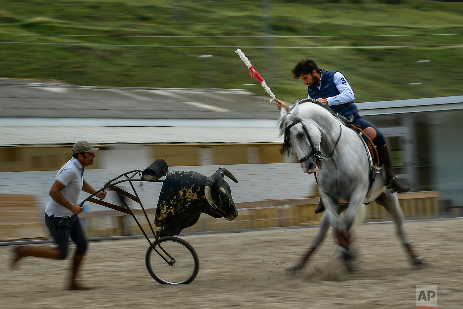 Roberto Armendariz rides one of his horse known as 'Diamante'', during a training sesion, at his ranch in Noain, northern Spain, June 28, 2019. (AP Photo/Alvaro Barrientos)