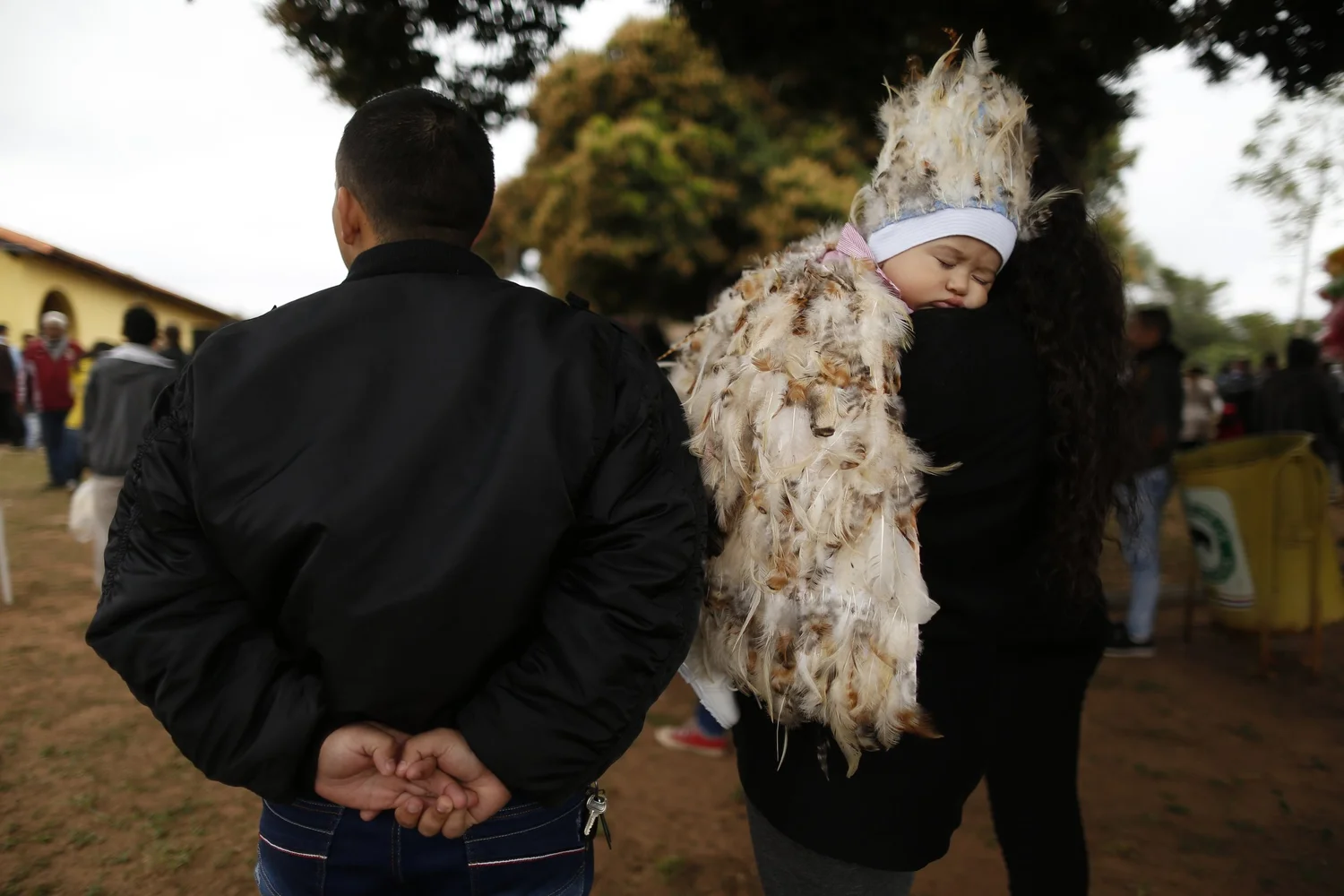 Paraguayans don feathered suits in homage to saint — AP Photos