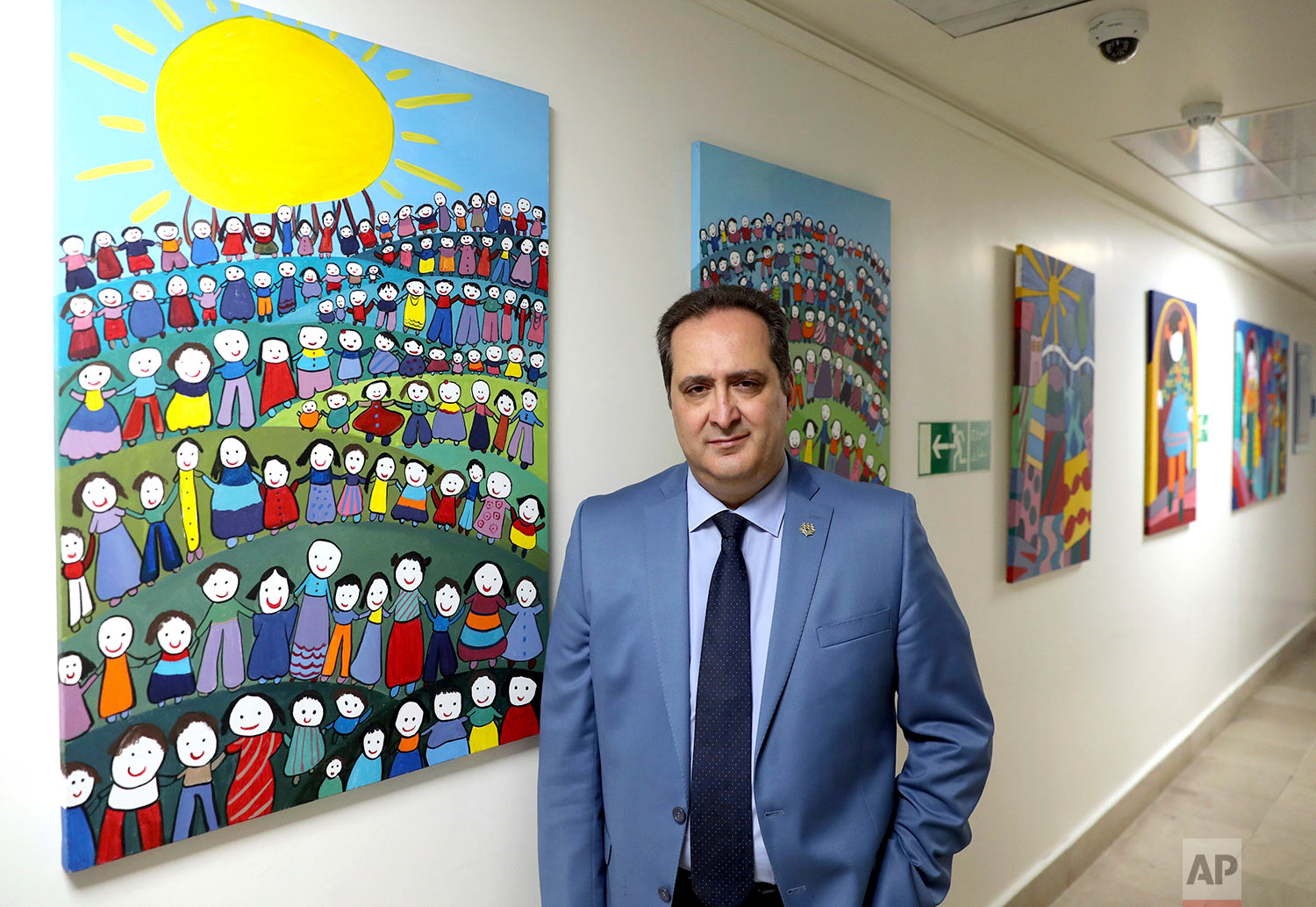 Dr. Arasb Ahmadian, head of the Mahak Children’s Hospital, is interviewed by The Associated Press at Mahak Hospital and Rehabilitation Center’s ward, in Tehran, Iran. (AP Photo/Ebrahim Noroozi)