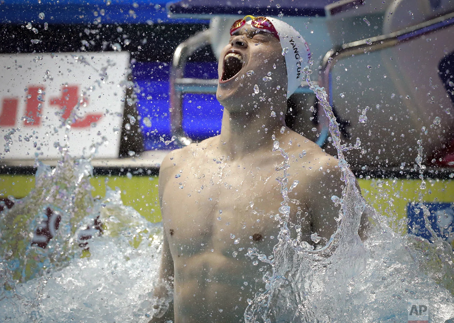 In this July 21, 2019, photo, China's Sun Yang reacts after winning the men's 400m freestyle final at the World Swimming Championships in Gwangju, South Korea. (AP Photo/Lee Jin-man)
