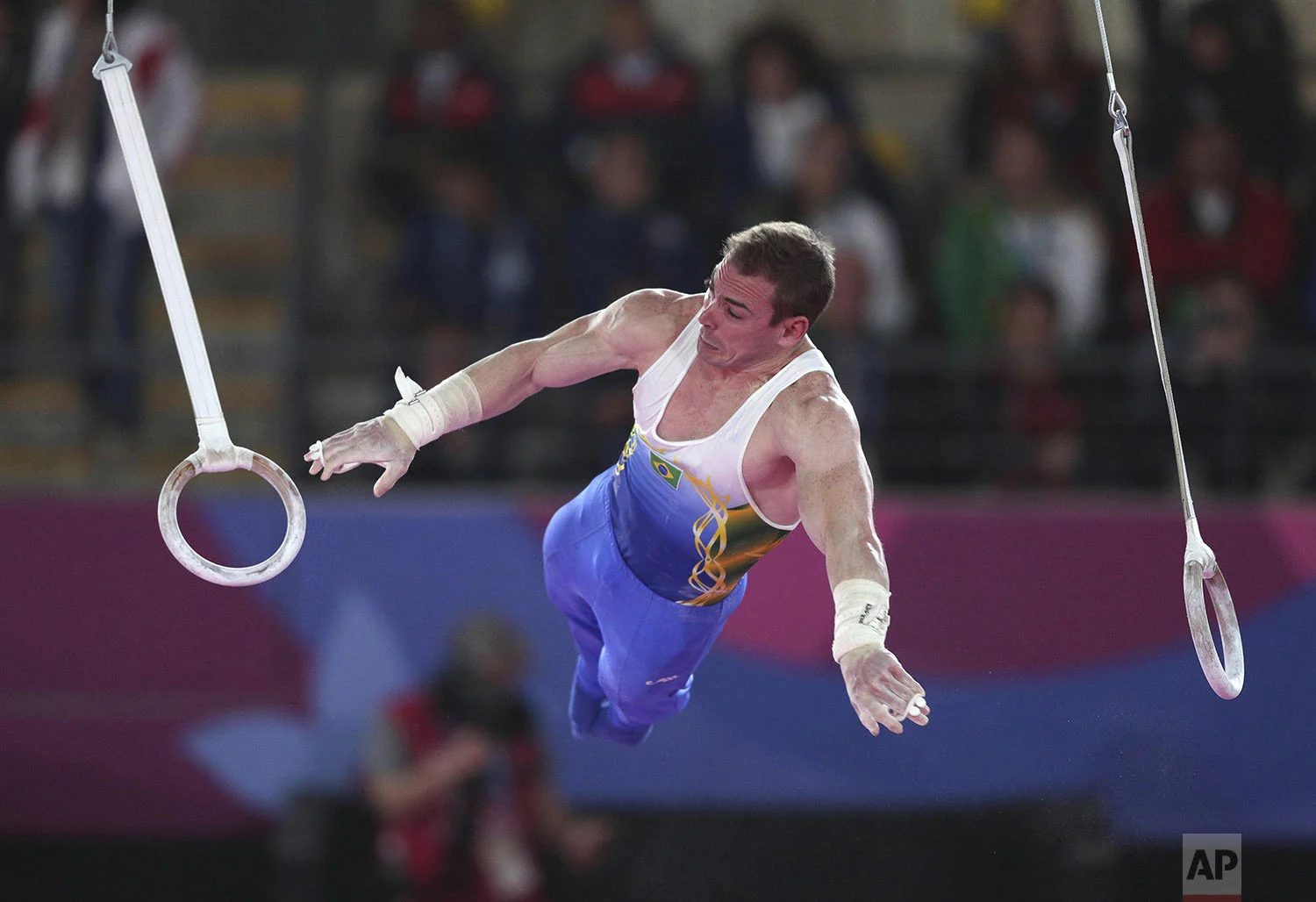 Arthur Zanetti of Brazil performs on the rings during the men's gymnastics qualification and team final at the Pan American Games in Lima, Peru, Sunday, July 28, 2019. (AP Photo/Martin Mejia)