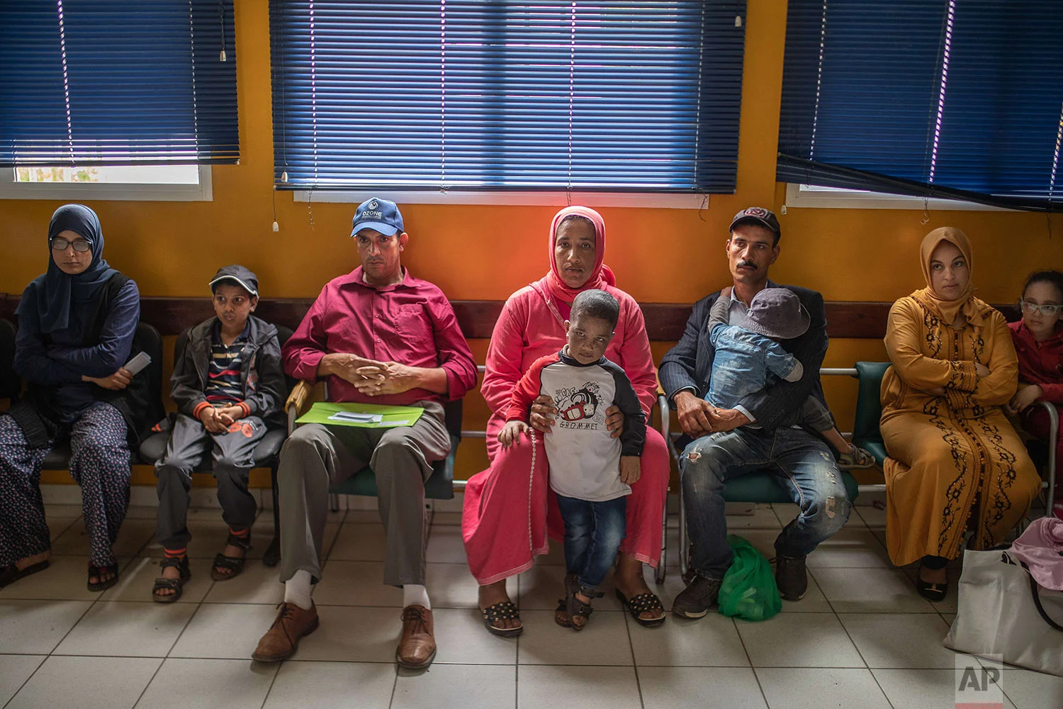 Families wait alongside their children affected by a rare disorder called xeroderma pigmentosum, or XP, inside a hospital in Casablanca, Morocco, July 24, 2019. (AP Photo/Mosa'ab Elshamy)