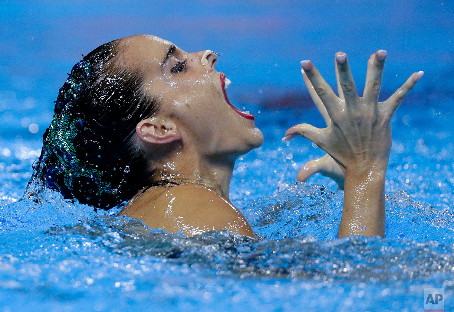 Spain's Ona Carbonell performs her routine in the artistic swimming solo free preliminary at the World Swimming Championships in Gwangju, South Korea, Monday, July 15, 2019. (AP Photo/Mark Baker)