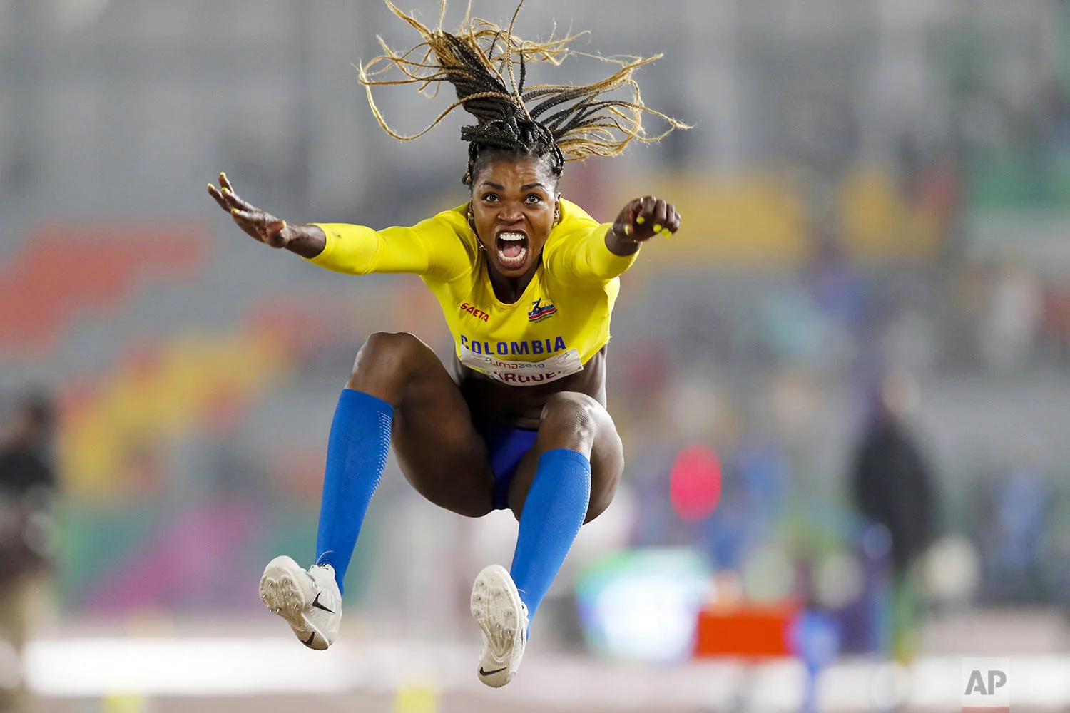 Caterine Ibarguen of Colombia competes in the women's long jump during the athletics at the Pan American Games in Lima, Peru, Tuesday, Aug. 6, 2019. (AP Photo/Fernando Llano)