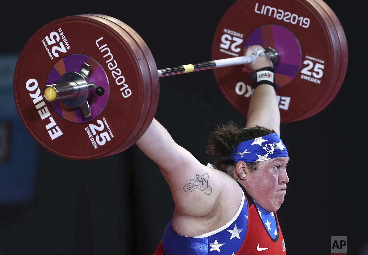 Sarah Robles of the United States competes in women's snatch +87 kg weightlifting at the Pan American Games in Lima, Peru, Tuesday, July 30, 2019. (AP Photo/Martin Mejia)