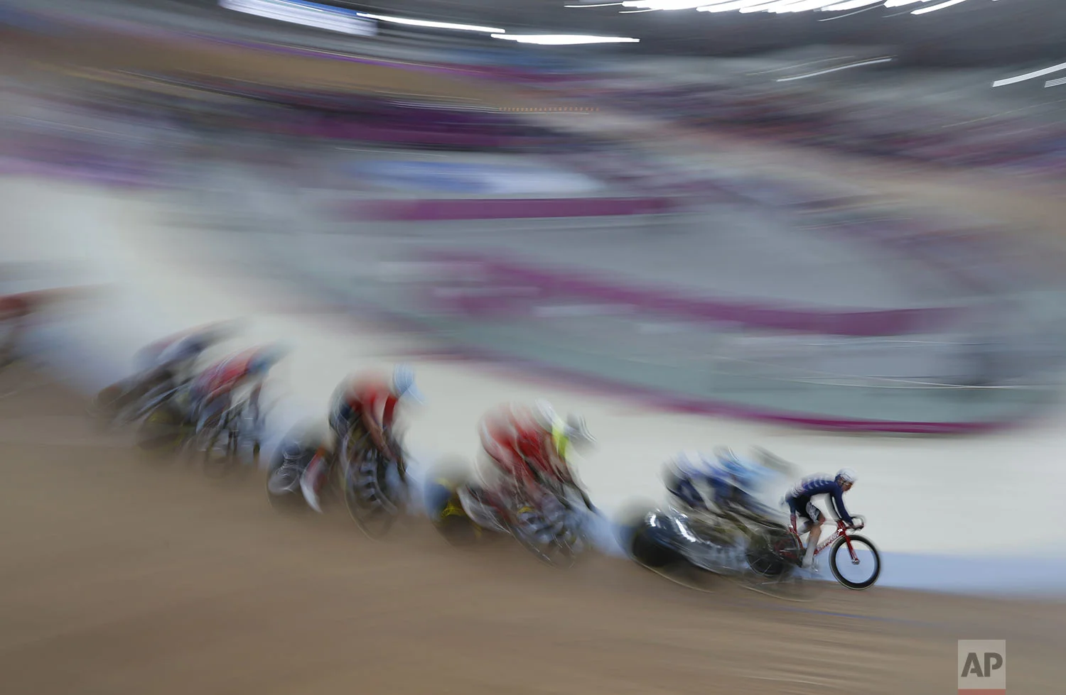 Daniel Holloway of the United States, right, competes in the cycling track men's omnium final at the Pan American Games in Lima, Peru, Thursday, Aug. 1, 2019. Holloway won the gold medal and Prado the silver medal. (AP Photo/Juan Karita)