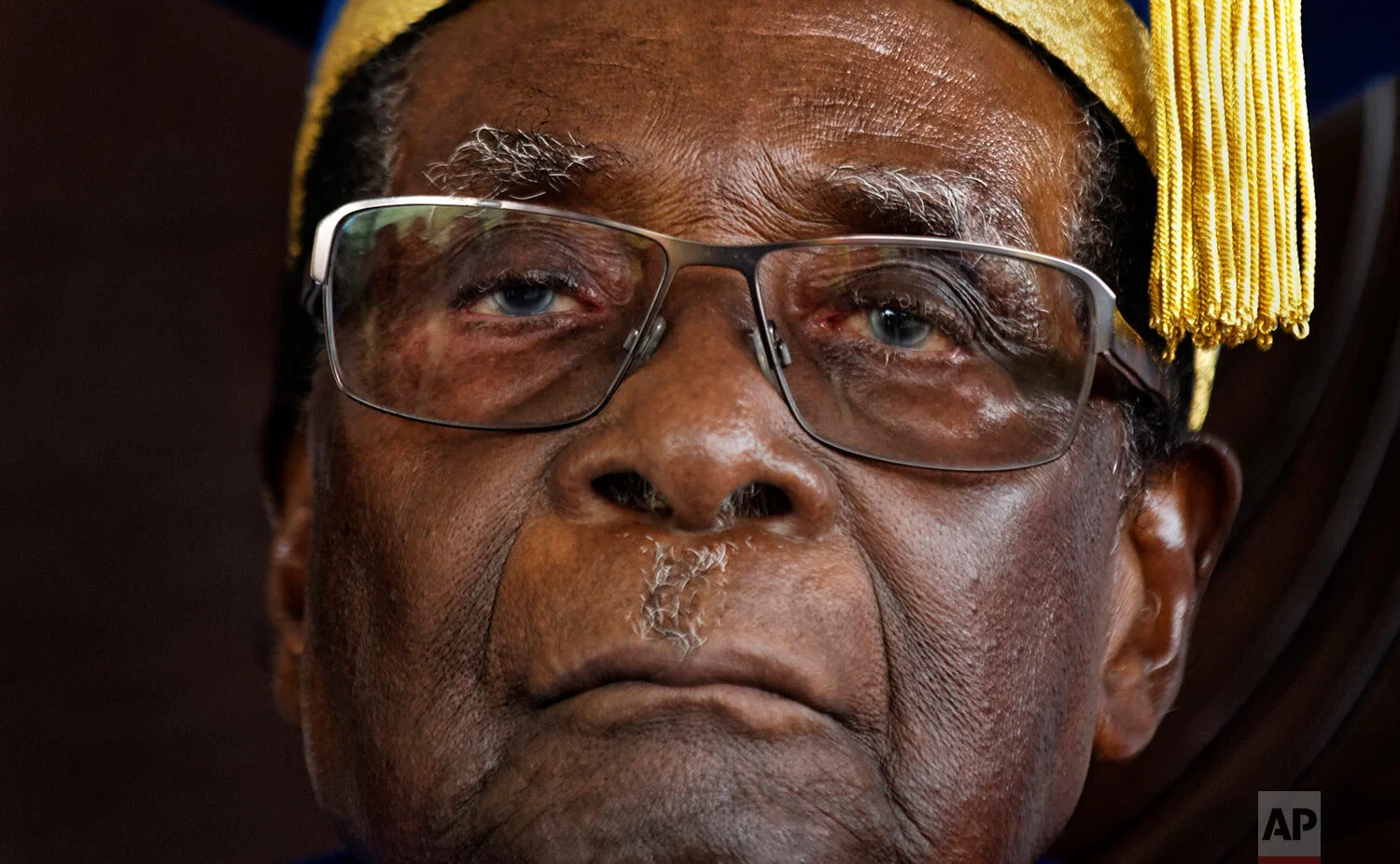 Zimbabwe's President Robert Mugabe officiates at a graduation ceremony at Zimbabwe Open University in Harare, Zimbabwe, Nov. 17, 2017. (AP Photo/Ben Curtis)