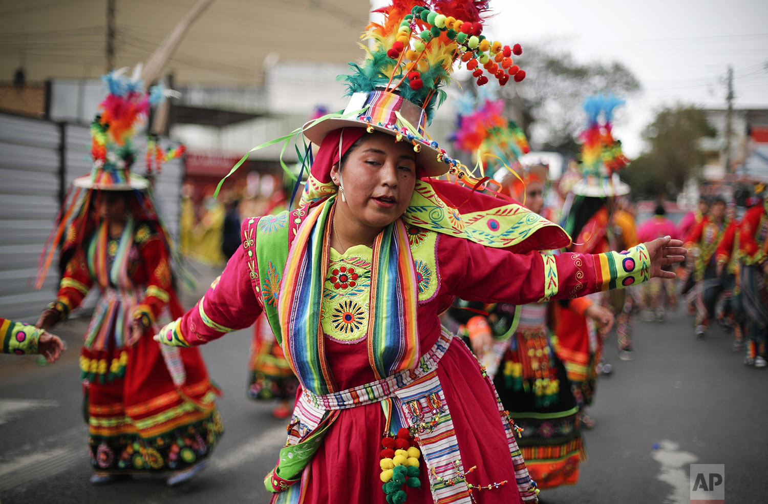  A dancer from the Bolivian "Morenada de Oruro" folklore group performs during parade in honor of Our Lady of Urkupina on her feast day, in Asuncion, Paraguay, Aug. 25, 2019. About 2,000 Bolivians live in Paraguay, most of them working as merchants. 