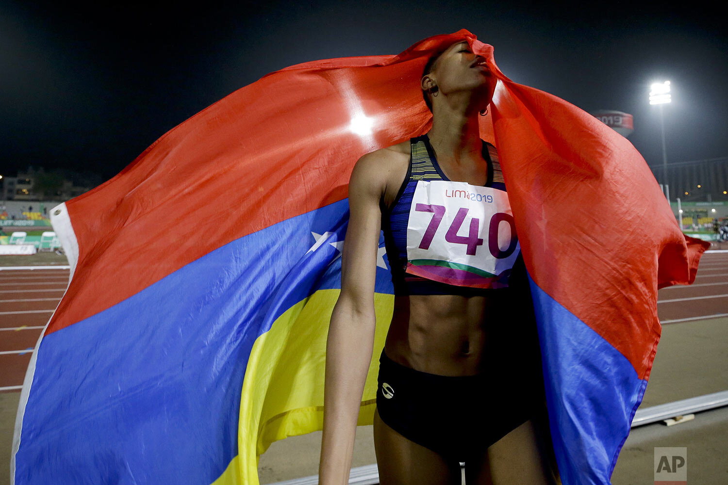  Yulimar Rojas of Venezuela celebrates after winning the gold medal in the women's triple jump final, setting a new Pan American record, during the athletics at the Pan American Games in Lima, Peru, Aug. 9, 2019. (AP Photo/Fernando Vergara) 