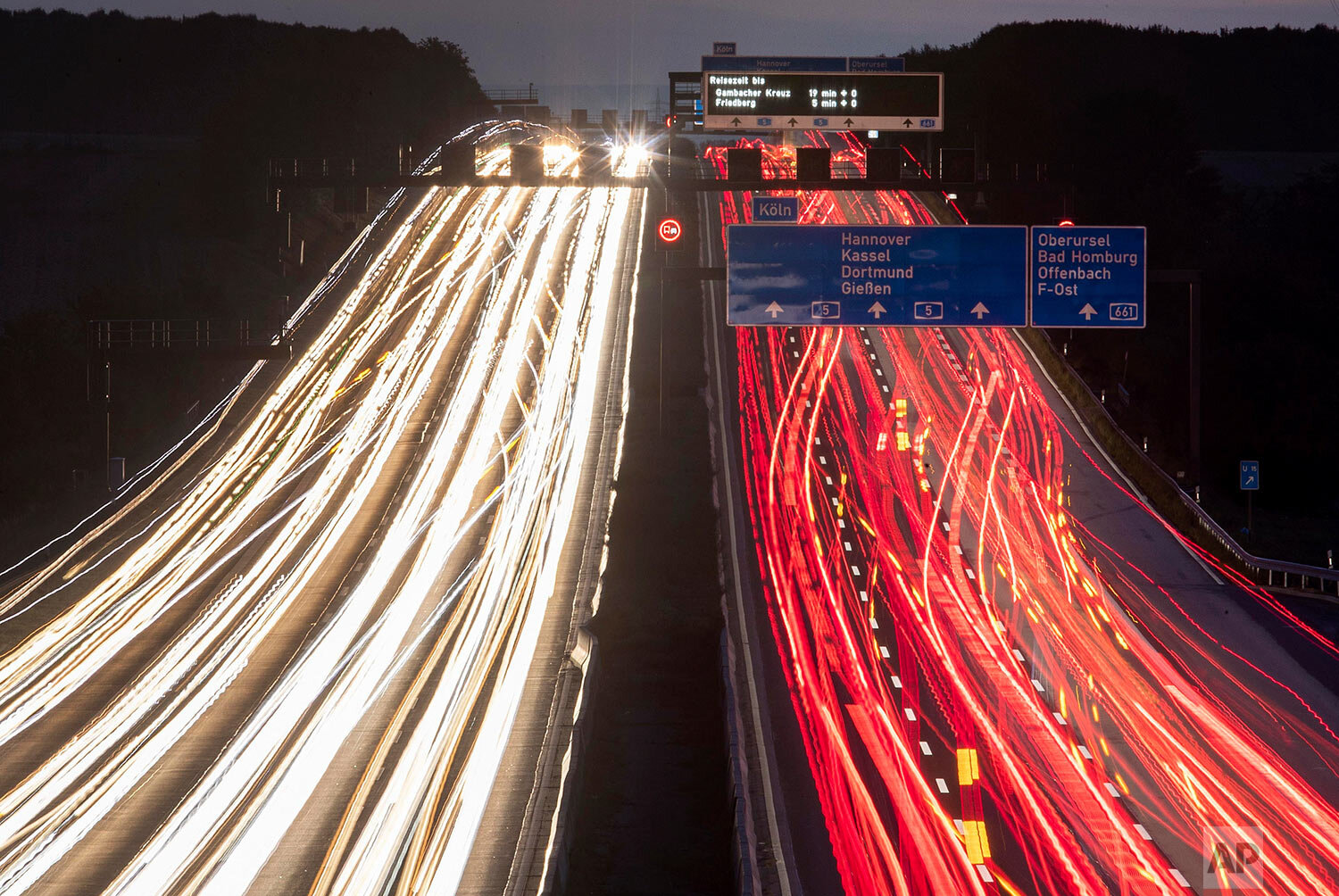  In this long exposure photo, cars drive on a highway in Frankfurt, Germany, early Thursday, Sept. 19, 2019. (AP Photo/Michael Probst) 