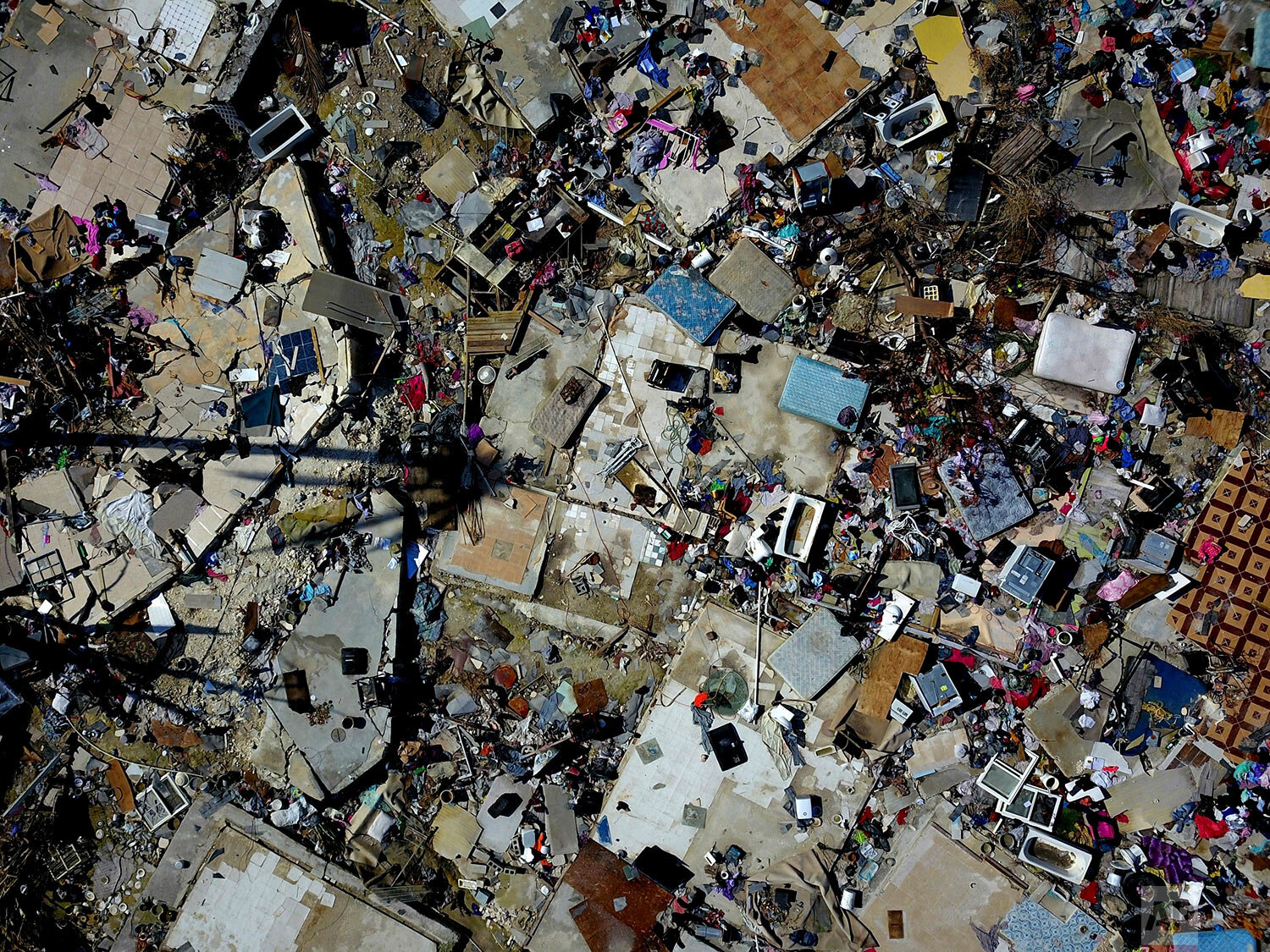 The rubble of a destroyed neighborhood stands in the aftermath of Hurricane Dorian in Abaco, Bahamas, Tuesday, Sept. 17, 2019. (AP Photo/Ramon Espinosa)