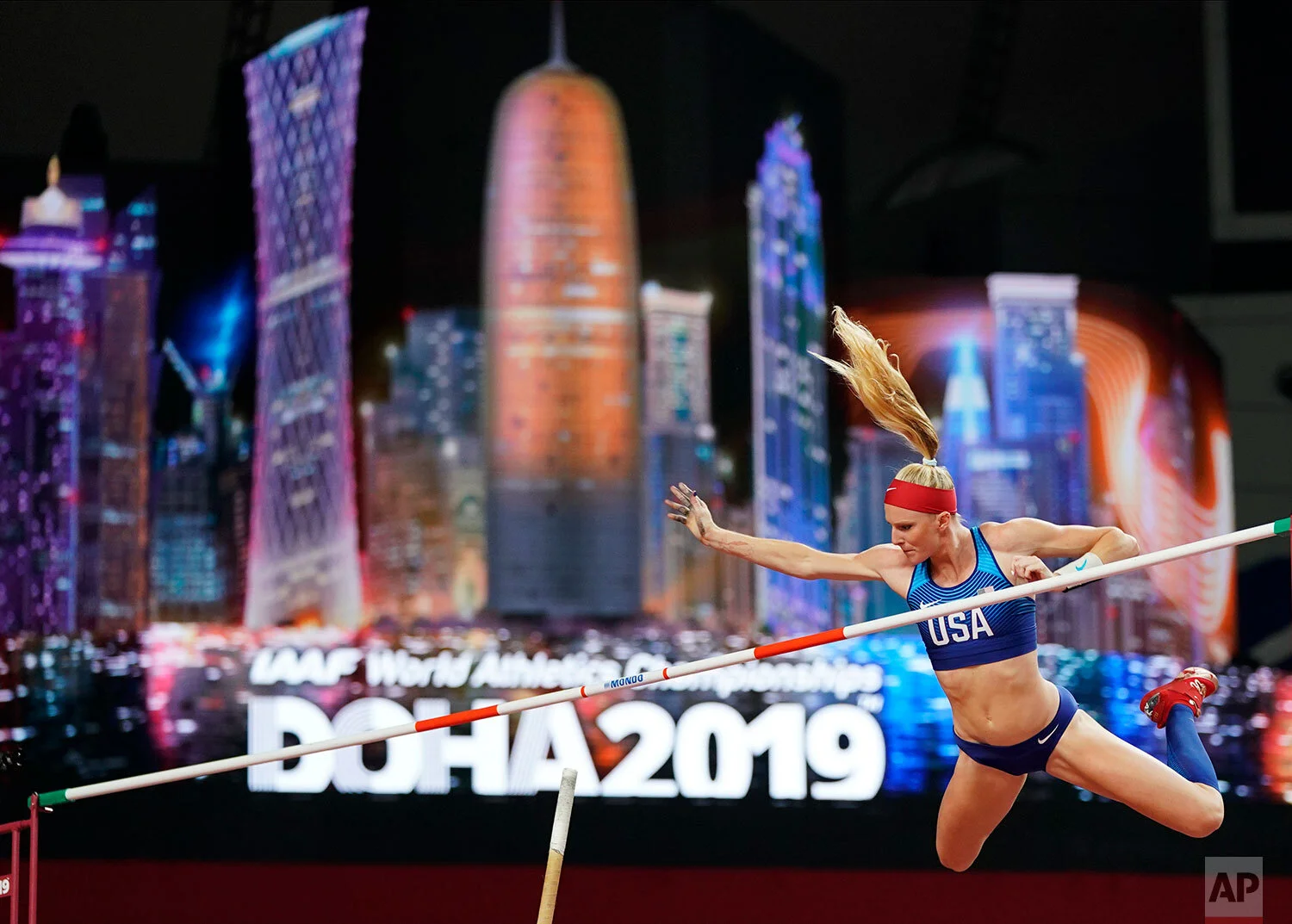 Sandi Morris, of the United States, competes during the women's pole vault qualifying round at the World Athletics Championships in Doha, Qatar, Friday, Sept. 27, 2019. (AP Photo/David J. Phillip)