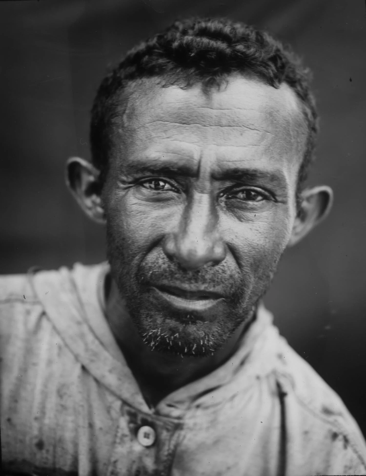 In this July 3, 2019 photo, fisherman Juzman Garcia, 40, poses for the picture after a journey on Lake Maracaibo at Cabimas, Venezuela. (AP Photo/Rodrigo Abd)