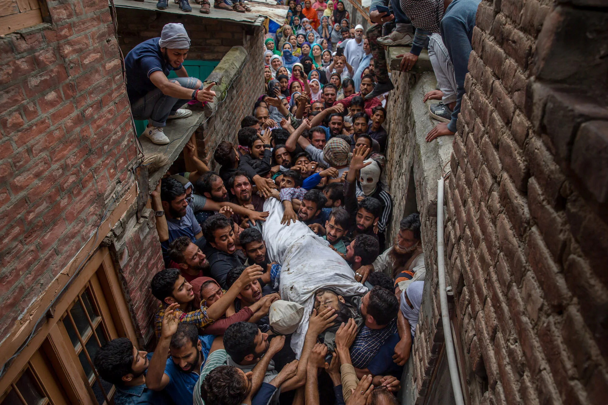 Kashmiri men shout pro-freedom slogans as they carry body of a local rebel Sajad Ahmed Gilkar, during his funeral in Srinagar, Indian controlled Kashmir, July 12, 2017. (AP Photo/Dar Yasin)