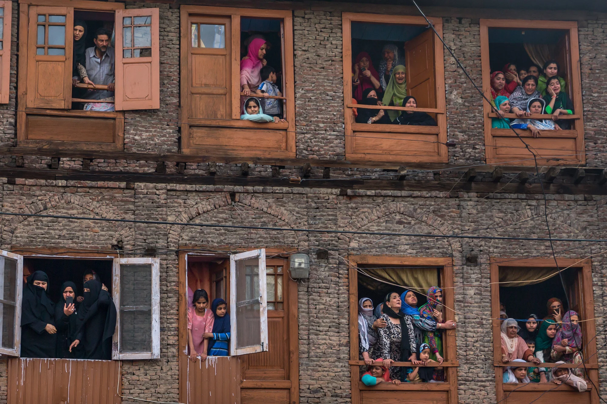 Kashmiri Muslims grieve as they watch funeral procession of Fayaz Ahmad Hamal, in Srinagar, Indian controlled Kashmir, May 5, 2018. (AP Photo/Dar Yasin)