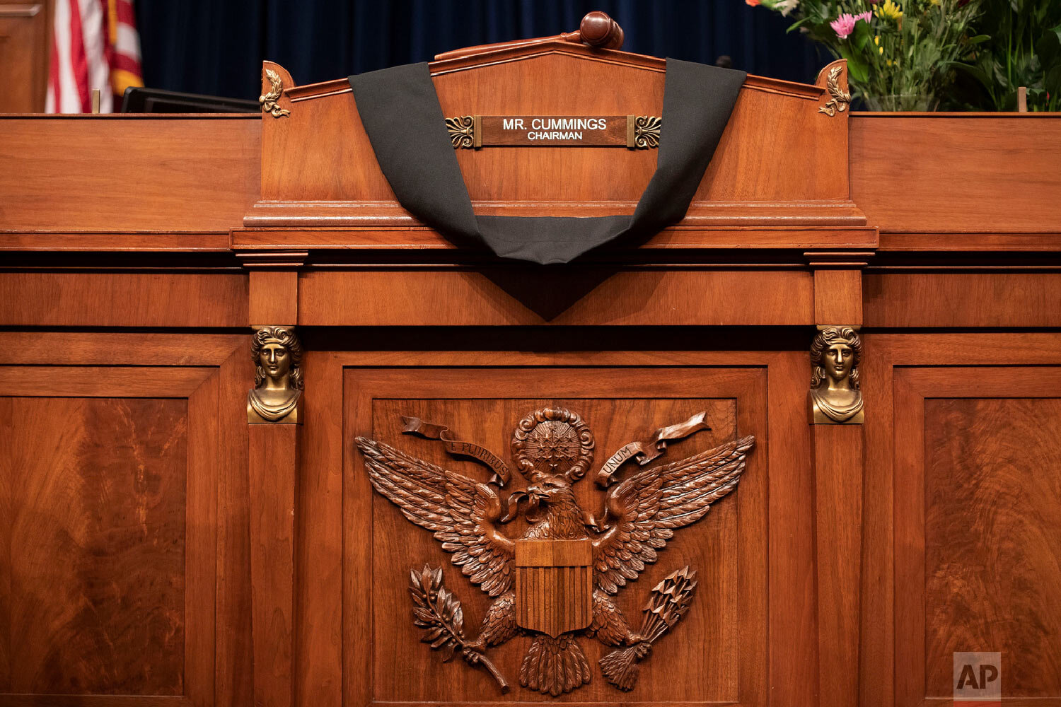 The House Oversight Committee Chairman's chair is draped in black cloth honoring Rep. Elijah Cummings, D-Md., on Capitol Hill in Washington, Thursday, Oct. 17, 2019. (AP Photo/Pablo Martinez Monsivais)
