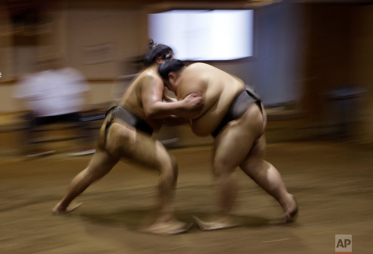 Sumo wrestlers train at the Musashigawa Sumo Stable at Beppu, western Japan on Friday, Oct. 18, 2019. Sumo wrestling is a traditional Japanese sport. (AP Photo/Aaron Favila)