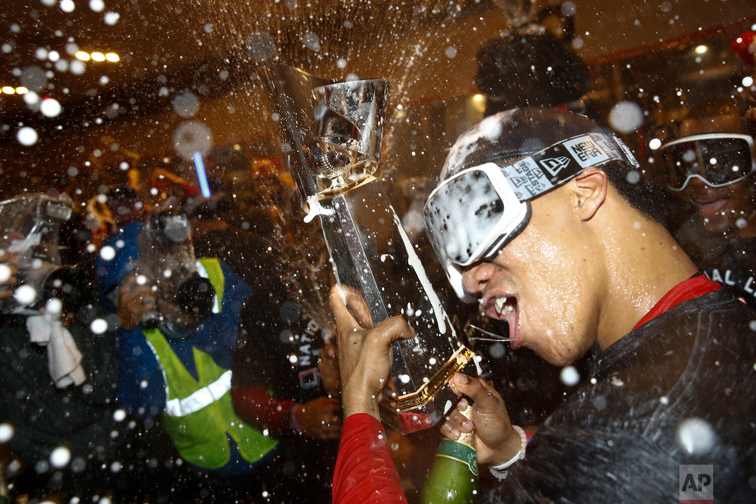 Washington Nationals' Juan Soto celebrates after Game 4 of the baseball National League Championship Series against the St. Louis Cardinals Wednesday, Oct. 16, 2019, in Washington. The Nationals won 7-4 to win the series 4-0. (AP Photo/Patrick Semansky)