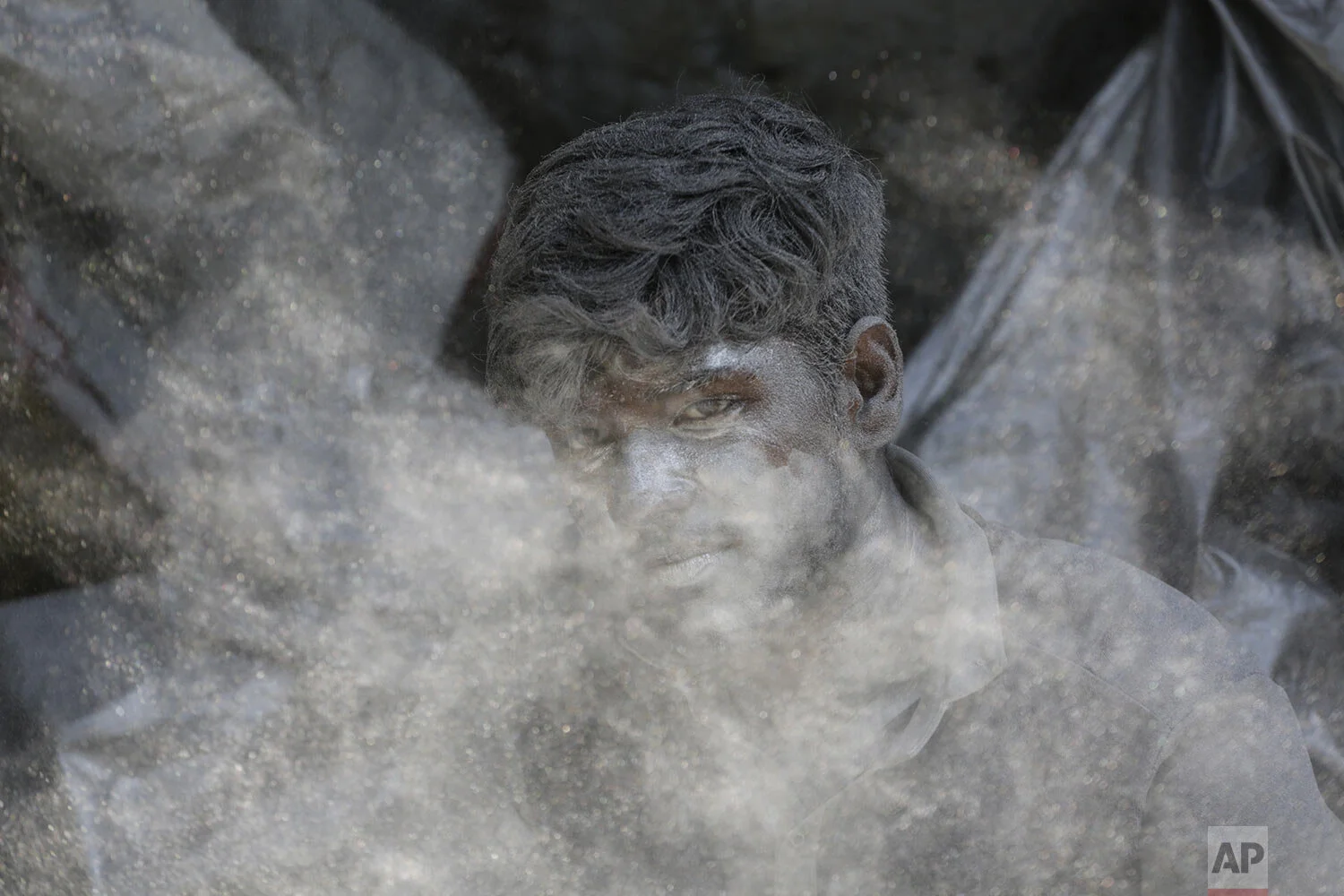An Indian worker mixes gun powder to make firecrackers for the upcoming Hindu festival Diwali at a factory on the outskirts of Ahmadabad, India, Tuesday, Oct. 15, 2019. AP Photo/Ajit Solanki)