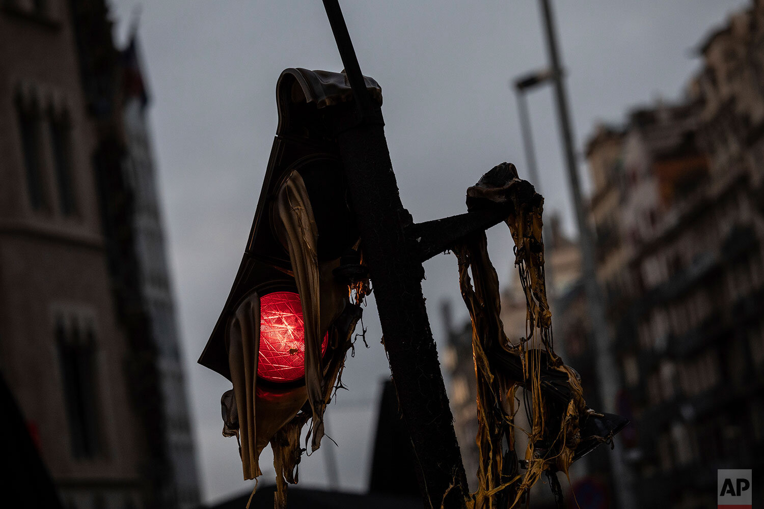  A damaged traffic light, following Friday clashes between protestors and police, in Barcelona, Spain, Saturday, Oct. 19, 2019. Masses of flag-waving demonstrators demanding Catalonia's independence and the release from prison of separatist leaders j