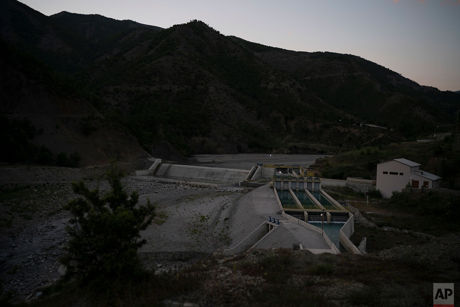  This June 20, 2019 photo shows the Langarica hydropower plant, on a tributary to the Vjosa River near Permet, Albania. As pressure to build dams intensifies in less developed countries, the opposite is happening in the U.S. and western Europe, where