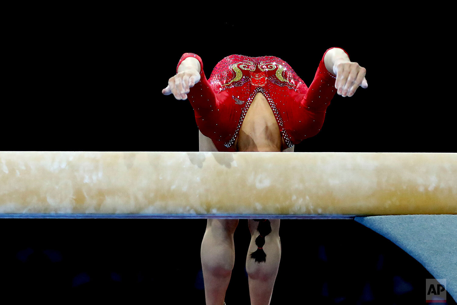  Tingting Liu of China performs on the balance beam during women's team final at the Gymnastics World Championships in Stuttgart, Germany, Tuesday, Oct. 8, 2019. (AP Photo/Matthias Schrader) 