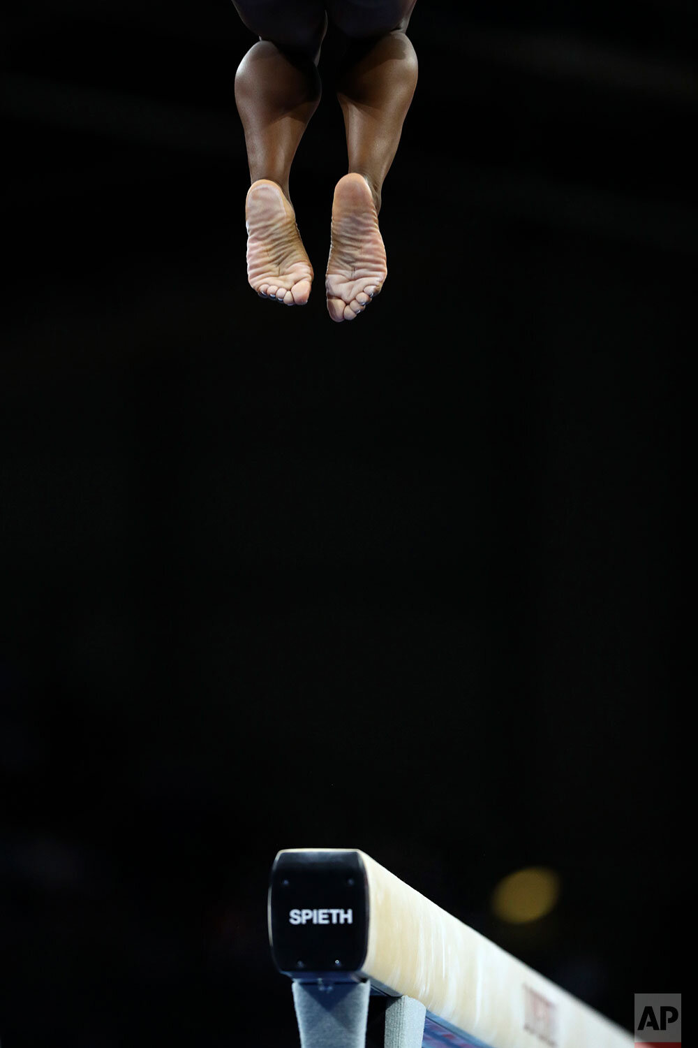  Simone Biles of the United States performs on the balance beam in the women's all-around final at the Gymnastics World Championships in Stuttgart, Germany, Thursday, Oct. 10, 2019. (AP Photo/Matthias Schrader) 