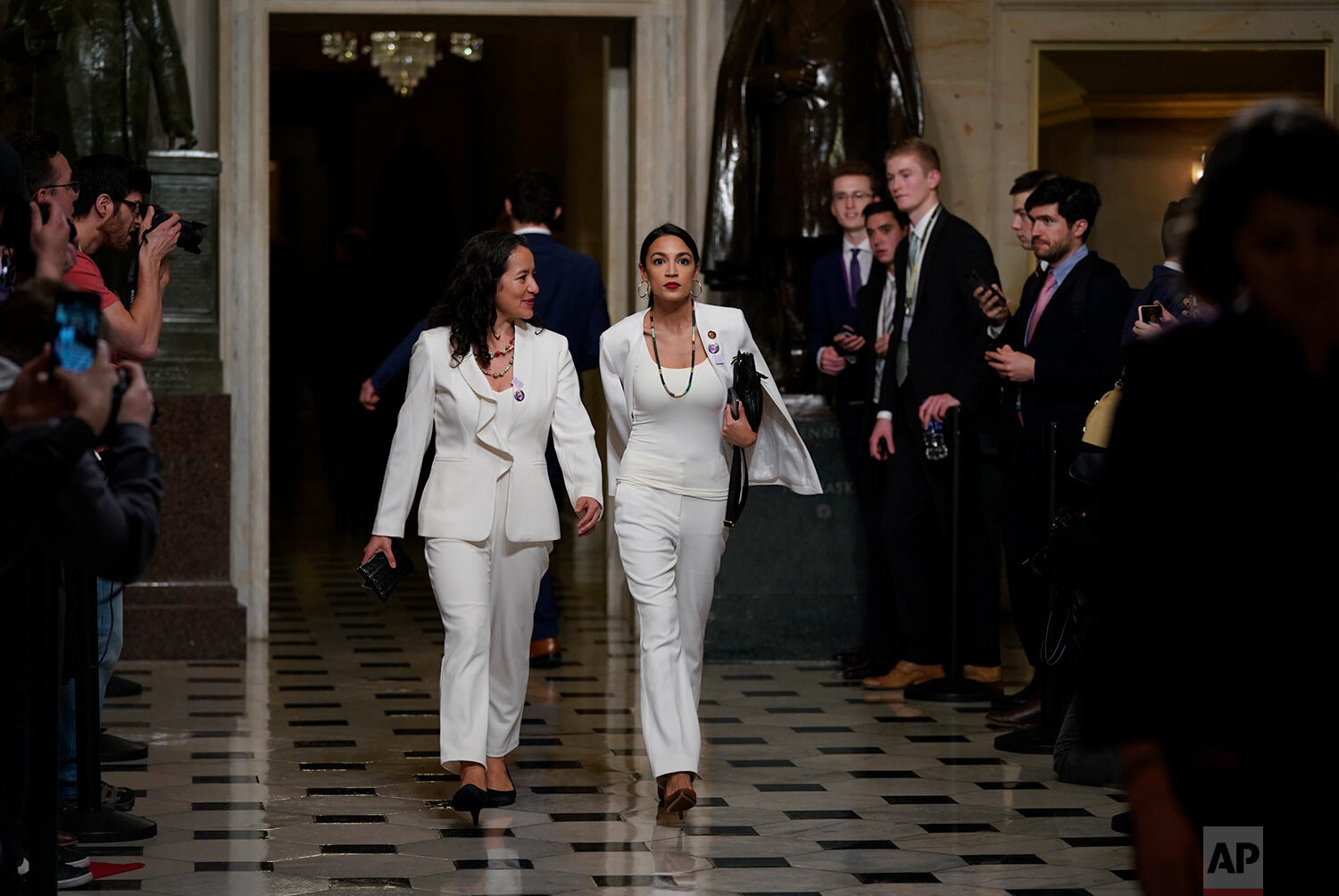  Rep. Alexandria Ocasio-Cortez, D-N.Y., right arrives with her guest, Ana Maria Archila of New York, to hear President Donald Trump deliver his State of the Union address to a joint session of Congress on Capitol Hill in Washington on Feb. 5, 2019. (
