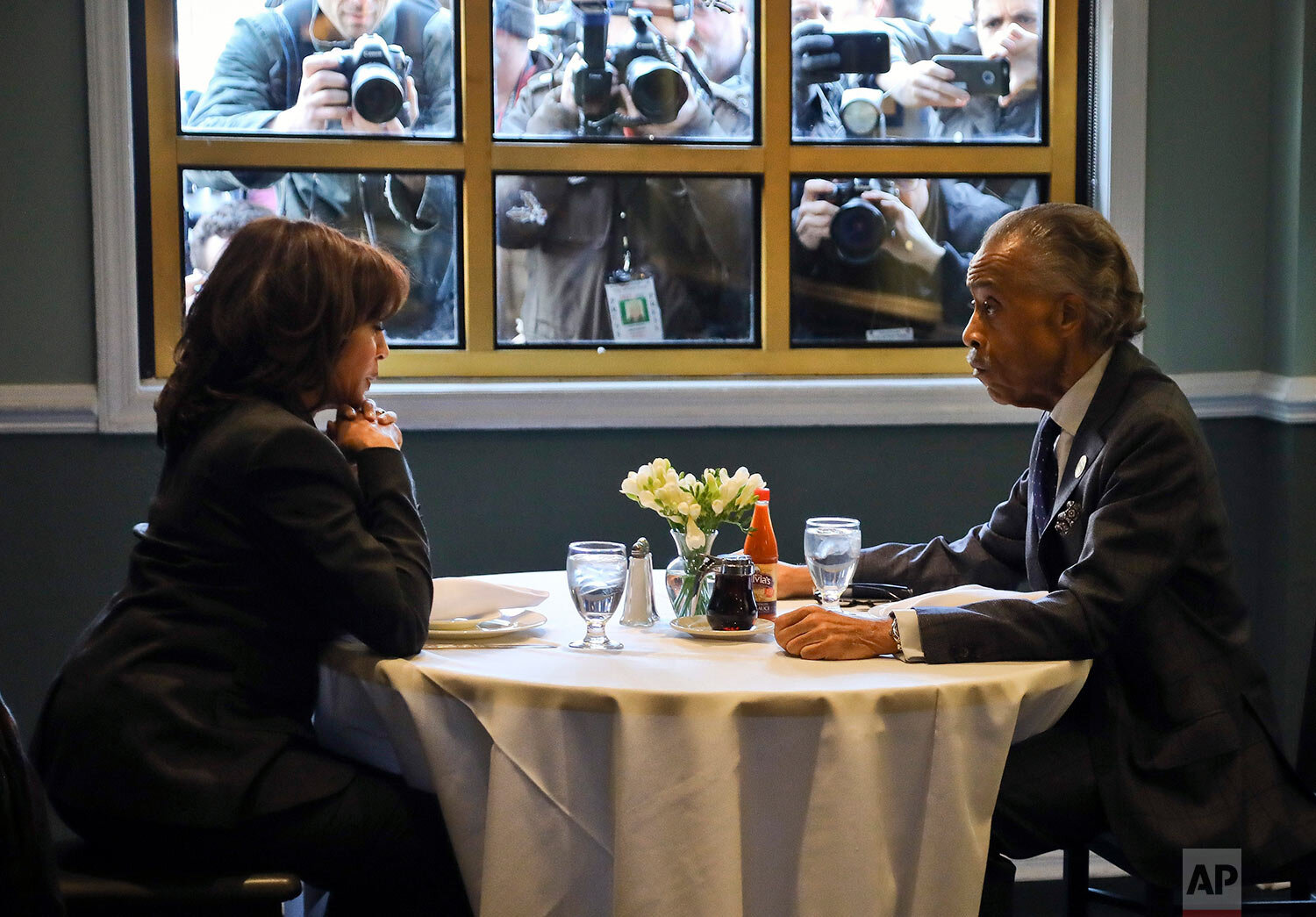  Democratic presidential candidate Sen. Kamala Harris, D-Calif., meets with civil rights leader Rev. Al Sharpton, president of the National Action Network, during lunch at Sylvia's Restaurant in the Harlem neighborhood of New York on Feb. 21, 2019. (